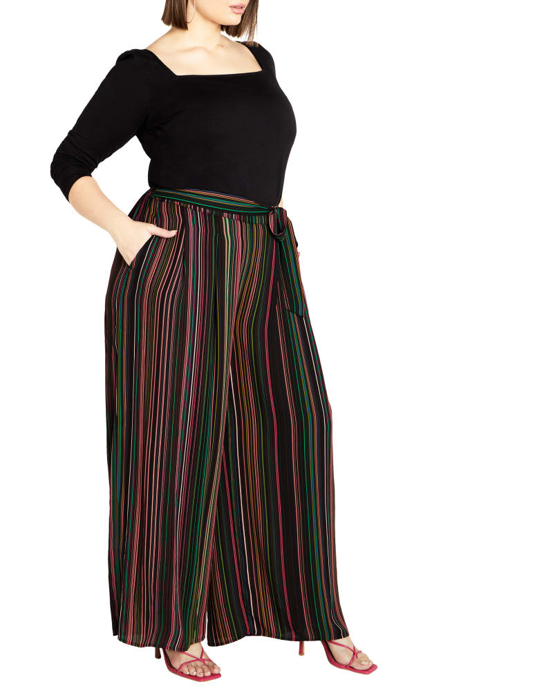 Front of a model wearing a size S PANT ILLUSION in Illusion by City Chic. | dia_product_style_image_id:320363